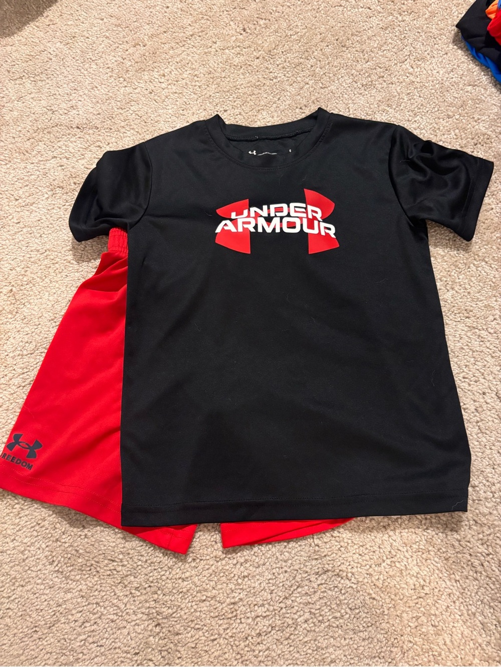 Under Armour Black Tee with Red Logo and Red Shorts
